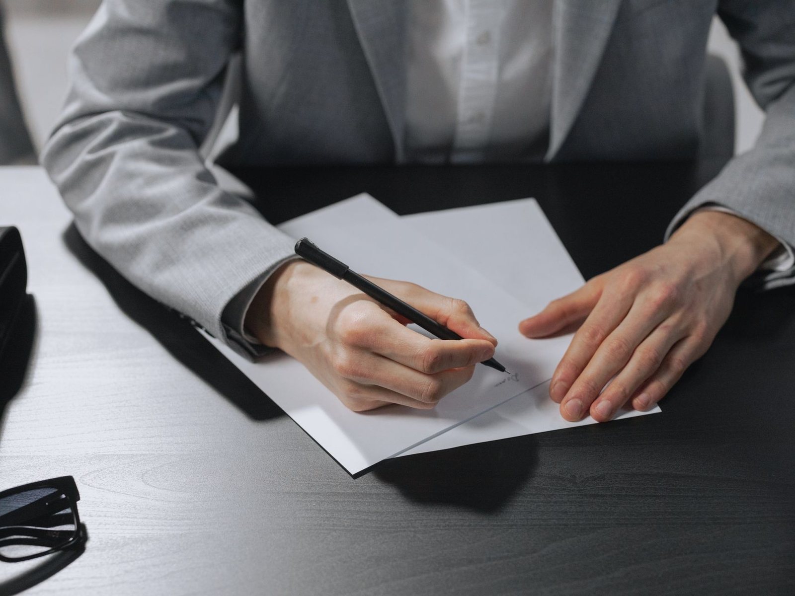 Attorney and client going over paperwork during a consultation