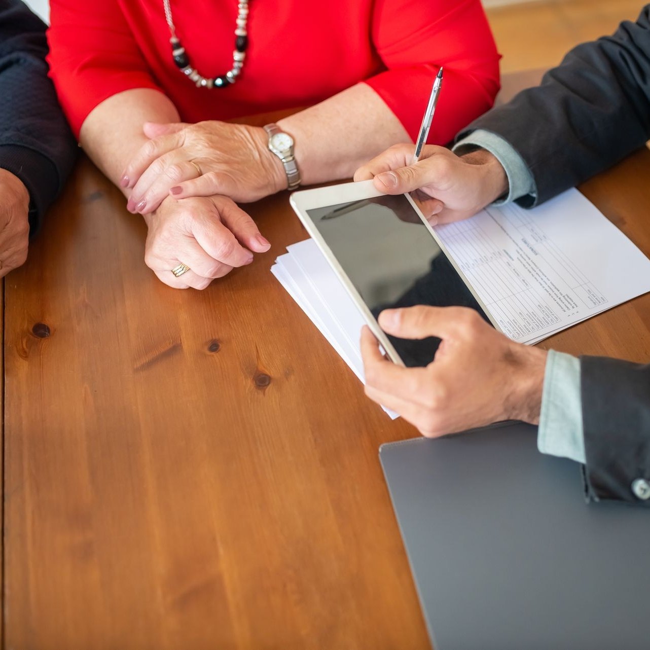 Support paperwork on a conference table during a client meeting